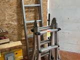a ladder that is leaning against a wall in a room