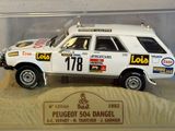 a model of a white car in a display case