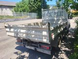 a truck that is parked on the side of the road