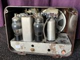 a metal box that has a bunch of gas bottles inside of it