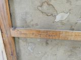 a picture of a piece of wood with writing on it