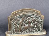 an image of a bronze figurine of a group of people