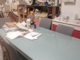 a table that has a lot of chairs around it