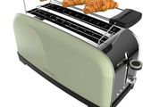 une image représentant un grille-pain sur lequel sont posés des croissants