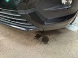 a close up of a car with a dirty front bumper