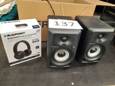 two speakers sitting next to each other on a table