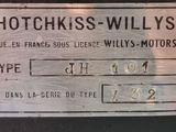a close up of a metal sign on a wall