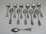 a lot of spoons and spoon spoons on the table
