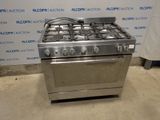 a stainless steel stove with four burners on it