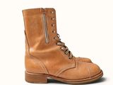 a picture of a pair of brown boots on a white background
