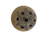an image of a ceramic button with holes in it