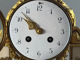 a clock that is sitting on top of a table
