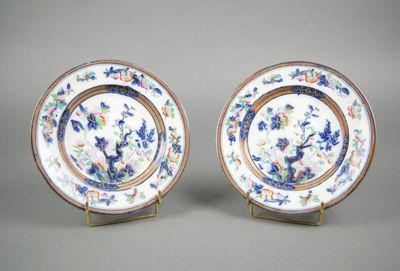 PINDER BOURNE & Co Paire d'assiettes en faïence fine à décor…