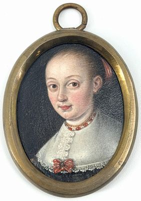 portrait d'une jeune fille en robe blanche avec un nœud rouge