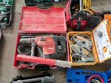 a lot of tools that are sitting on the floor