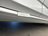 a sticker that says caution on the side of a car