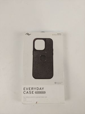 the back of a black phone case sitting on top of a white box