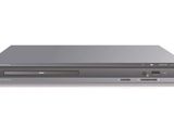 a close up of a dvd player sitting on top of a white surface