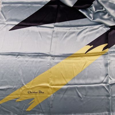 a large flag with a yellow and black design on it