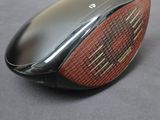a close up of a golf club on a table