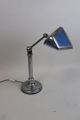 an image of a desk lamp on a white surface