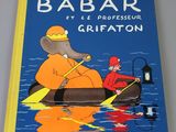 a blue book with a picture of a man in a boat