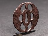 a small metal object that is sitting on a table