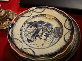 a plate with a picture of an elephant on it on a table