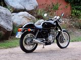 a motorcycle that is parked on the side of the road
