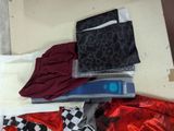 a pile of clothing that is sitting on a table