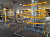 a large warehouse with a lot of shelvings in it