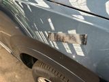 a close up of a car with a sticker on it
