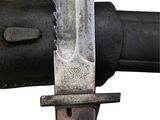 a close up of a knife with a blade on it