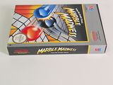 a box of nintendo games sitting on a table