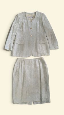 the two pieces of clothing are laid out on a white surface