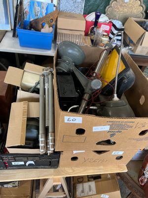 a box full of assorted items sitting on the floor