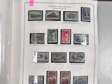 a book with a bunch of stamps on it