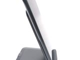 a cell phone that is sitting on a stand