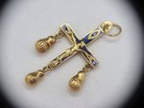 an image of a gold cross with a blue and white cross on it