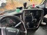a steering wheel and dashboard of a truck with a steering wheel