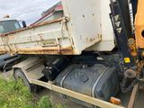a truck that is parked on the side of the road