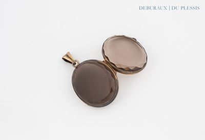 a close up of two brown glass lockes on a white surface