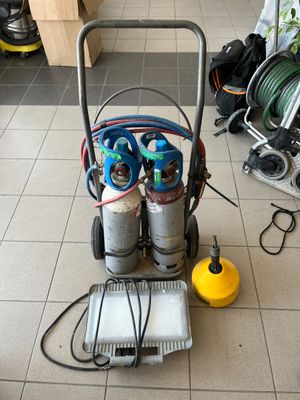 une image représentant un chariot sur lequel sont posés deux cylindres