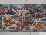 a rug with a picture of a woman playing a harp