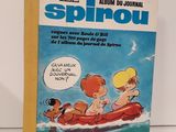 un livre avec une illustration représentant deux enfants dans un bateau sur l'eau