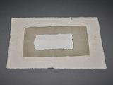une photo d'une feuille de papier sur laquelle est collé un morceau de ruban adhésif