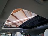 the interior of a car with the sunroof down and the sunroof down