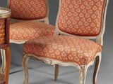 pair of louis xv style chairs and a side table