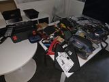 a table with a lot of electronics on top of it