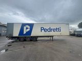 a semi truck that is parked in a parking lot